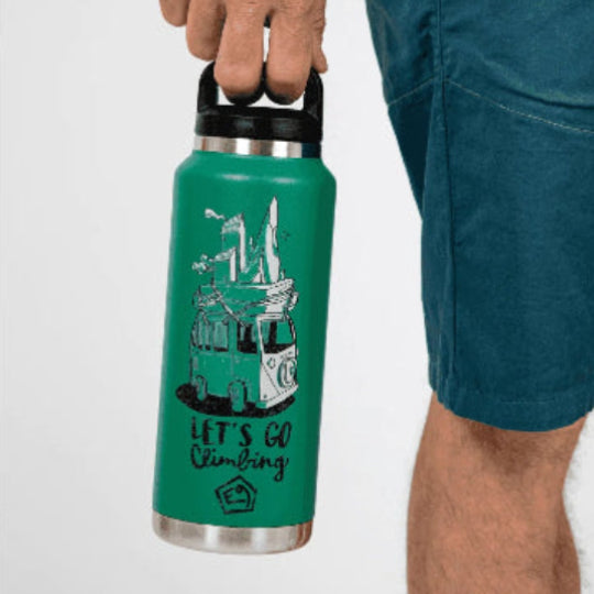 Person holding a teal water bottle with a graphic design and text on a white background