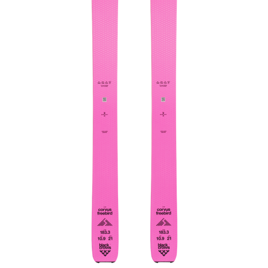 A pair of pink Corvus Freebird skis, showcasing the profile view of the skis.