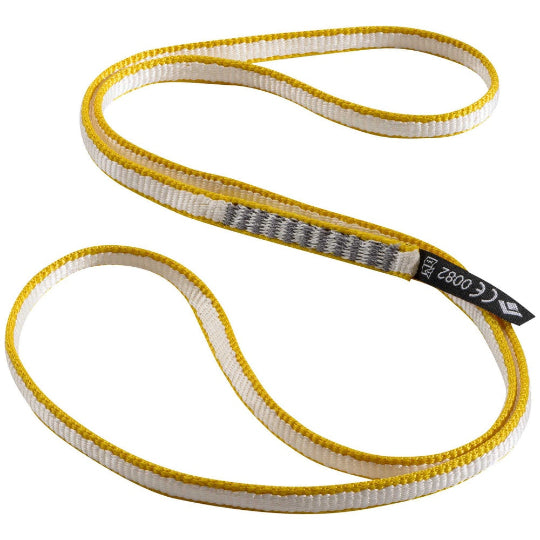 A coiled yellow and white dynex runner sling for climbing, with visible brand marking.