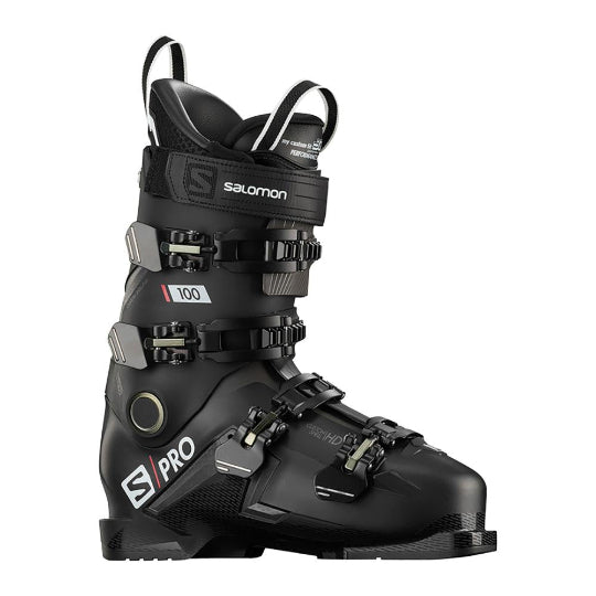 A black Salomon S/PRO 100 ski boot with adjustable straps and branding on the cuff.