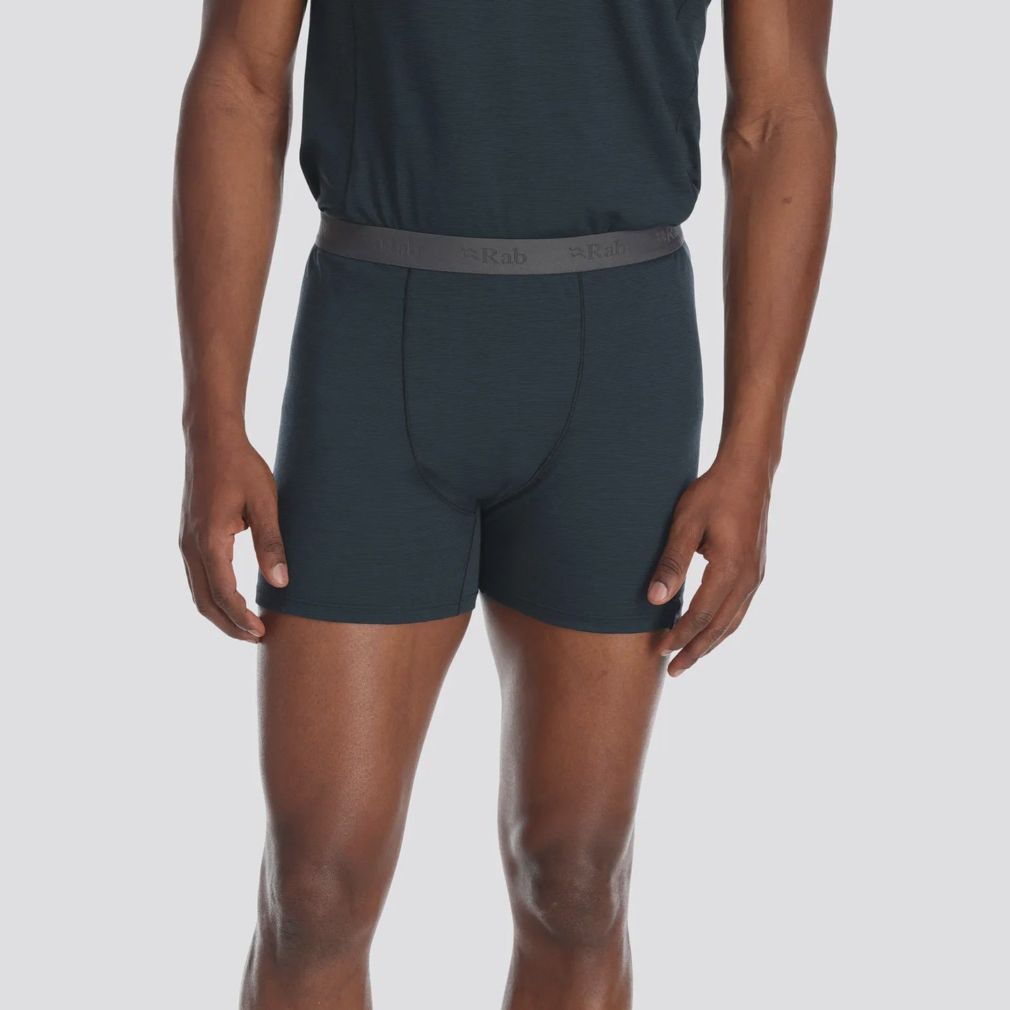 A pair of navy blue Syncrino boxer briefs designed for men.