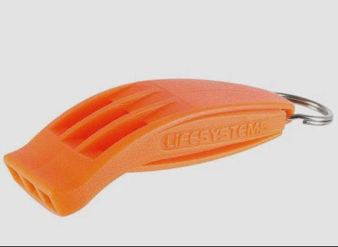 Orange whistle with key ring on a light gray background