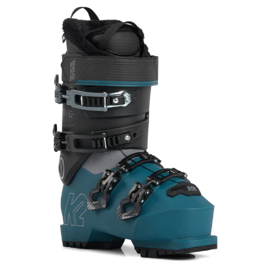 Teal and black ski boot with visible branding on a white background