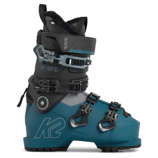 Teal and black ski boot with K2 branding on a white background