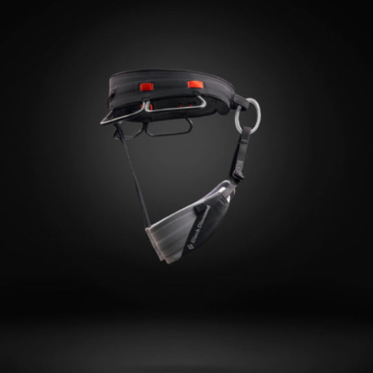 Black and grey harness  on a dark background