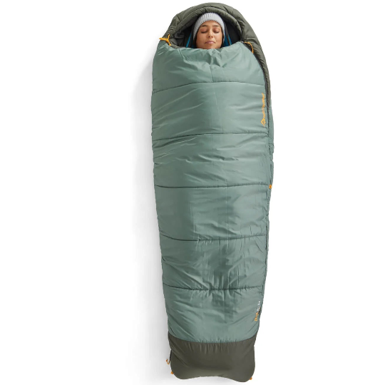 Person sleeping in a green sleeping bag on a white background