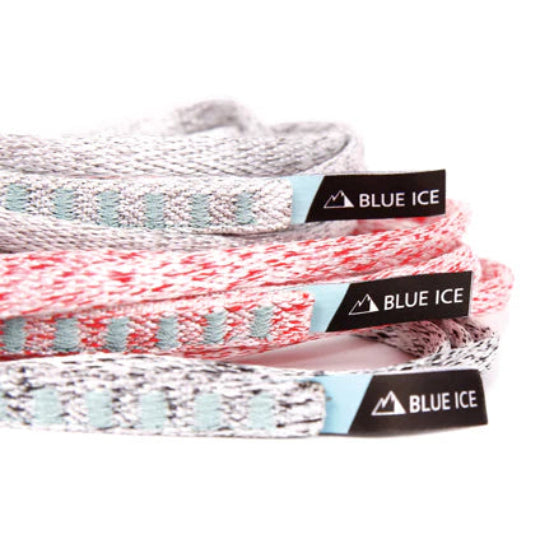 Close-up of climbing slings with Blue Ice brand labels on a white background