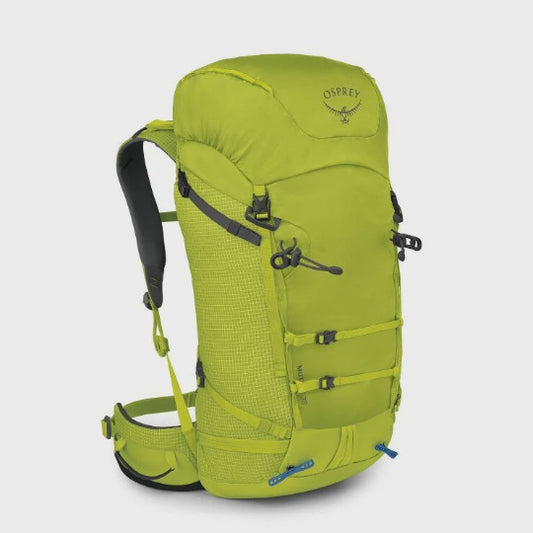 Green Osprey backpack on a light gray background