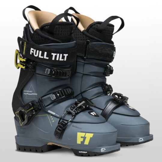 Gray ski boots with black straps and 'Full Tilt' branding on a light gray background