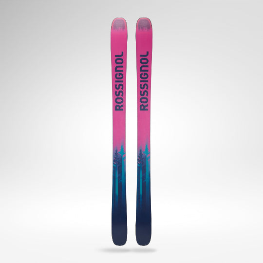 Pink and blue Rossignol skis on a white background