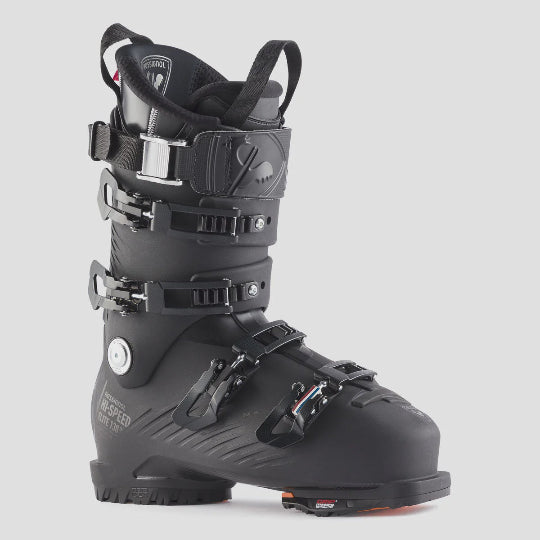 Black ski boot with multiple straps on a light gray background