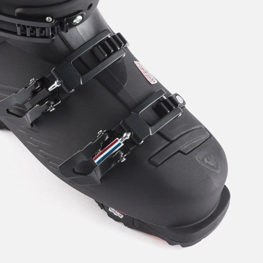 Close-up of a black ski boot with a white background