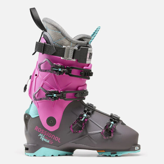 Gray and pink ski boot with visible branding on a white background