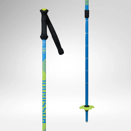 Two blue ski poles with black and green accents on a white background
