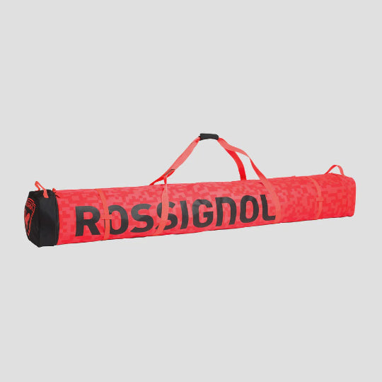 Red ski bag with 'Rossignol' branding on a white background