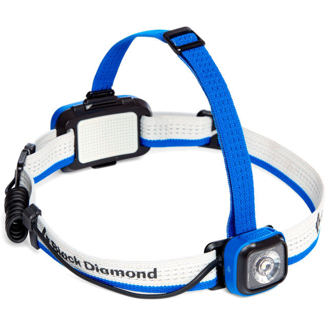 A Black Diamond Sprinter 500 headlamp with a blue and white strap, featuring a single front lens, a rechargeable battery compartment, and an elastic headband.