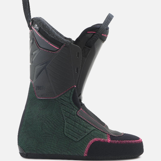 Green and black boot with pink accents on a white background