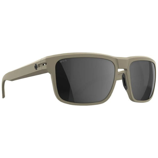 Sunglasses with beige frame and dark lenses on a white background