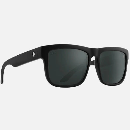 Black sunglasses with a gray gradient lens on a light gray background