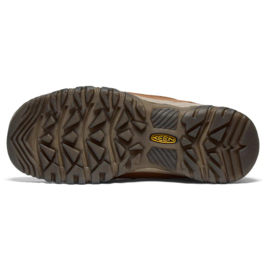 Close-up of a brown shoe sole with 'Keen' branding on a white background