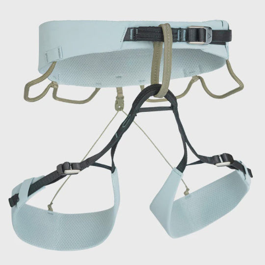 Light blue climbing harness with multiple straps on a light gray background